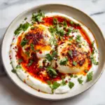 Turkish eggs with Aleppo chili butter and garlicky yogurt